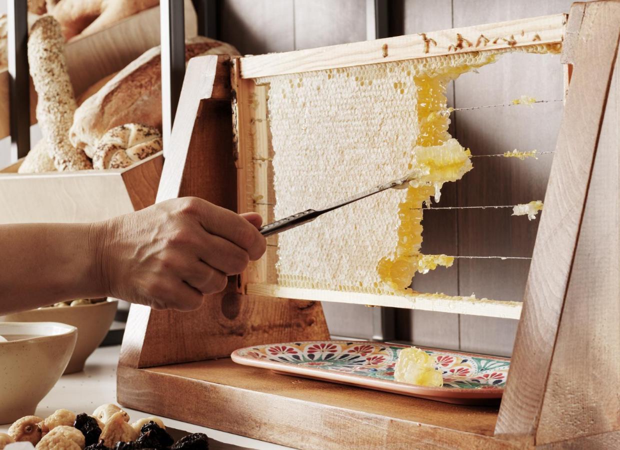 Nautilux Rethymno By Mage Hotels Экстерьер фото Honeycomb being scraped from a frame